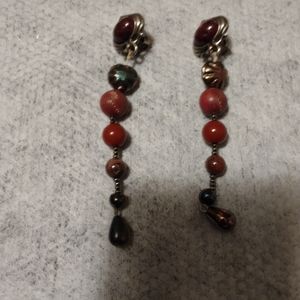 VINTAGE UNIQUE PAIR OF CLIP ON EARRINGS.